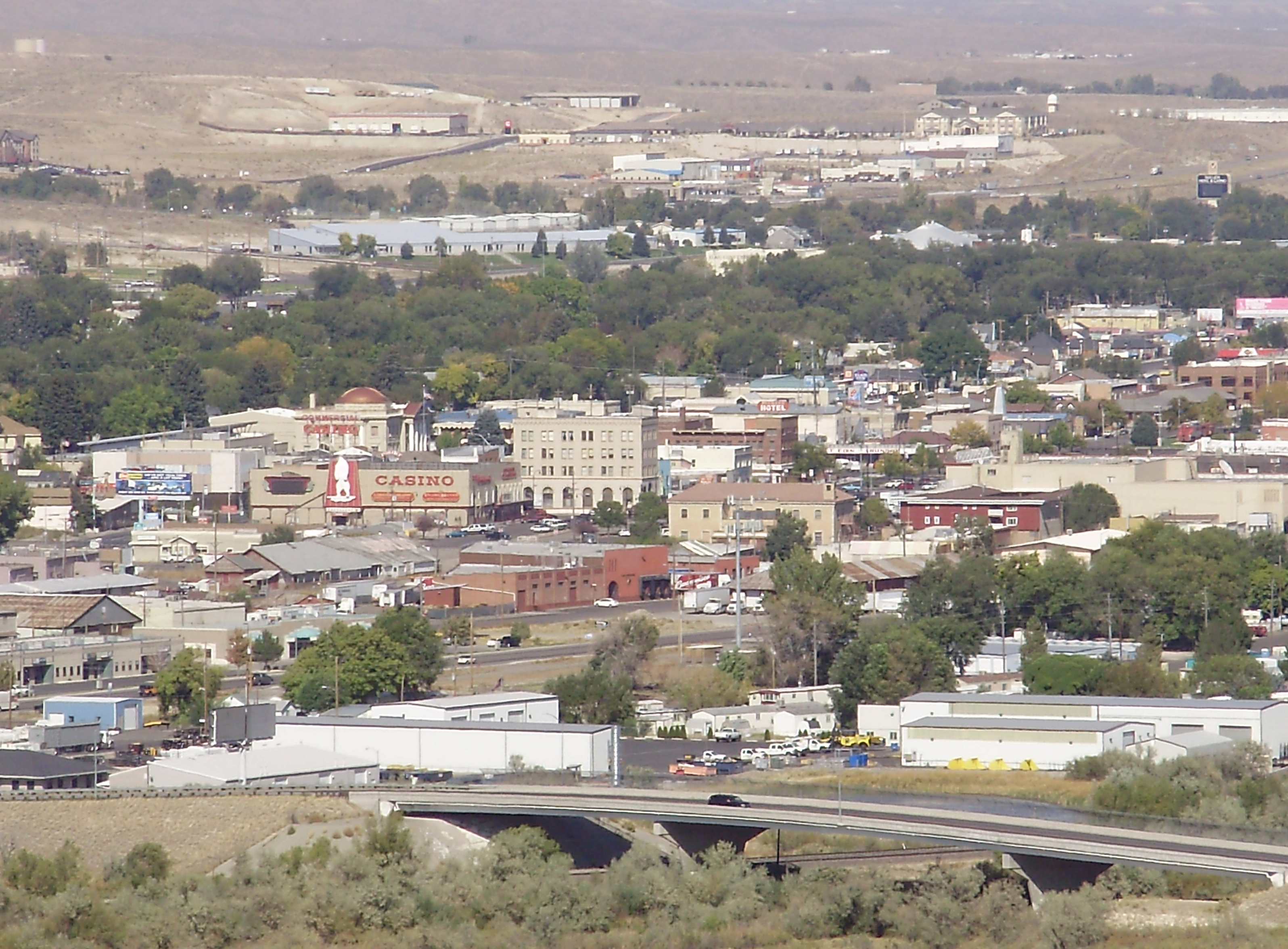 Elko (Shoshoni: Natakkoa, "Rocks Piled on One Another") is the largest city in and county seat of Elko County, Nevada, United States. With a 2020 population of 20,564, Elko is currently growing at a rate of 0.31% annually and its population has increased by 11.86% since the 2010 Census, which recorded a population of 18,297. Elko serves as the economic hub of the Ruby Valley, a region with a population of over 55,000. 
Elko is 21 miles (34 km) from Lamoille Canyon and the Ruby Mountains, dubbed the Swiss Alps of Nevada, providing year round access to recreation including hiking, skiing, hunting, and more than 20 alpine lakes.
 The city straddles the Humboldt River.  Spring Creek, Nevada, serves as a bedroom community 6 miles (9.7 km) from the city with a population of 13,805.
Elko is the principal city of the Elko Micropolitan Statistical Area, a micropolitan area that covers Elko and Eureka counties. It is the largest city for over 130 miles (210 km) in all directions, making it, as its city motto states, "The Heart of Northeast Nevada".
It is home to Great Basin College, as well as to the National Weather Service Weather Forecast Office serving most of northern and central Nevada.