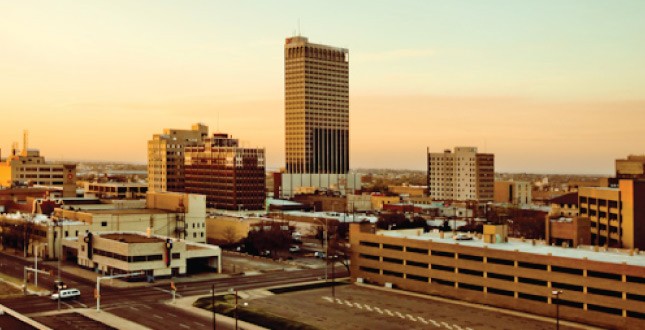 Amarillo ( AM-ə-RIL-oh; Spanish for "yellow") is a city in the U.S. state of Texas and the seat of Potter County. It is the 14th-most populous city in Texas and the largest city in the Texas Panhandle. A portion of the city extends into Randall County. The estimated population of Amarillo was 200,393 as of April 1, 2020. The Amarillo metropolitan area had an estimated population of 308,297 as of 2020.The city of Amarillo, originally named Oneida, is situated in the Llano Estacado region. The availability of the railroad and freight service provided by the Fort Worth and Denver City Railroad contributed to the city's growth as a cattle-marketing center in the late 19th century.Amarillo was once the self-proclaimed "Helium Capital of the World" for having one of the country's most productive helium fields. The city is also known as "The Yellow Rose of Texas" (as the city takes its name from the Spanish word for yellow), "Yellow City" for its name, and "Rotor City, USA" for its V-22 Osprey hybrid aircraft assembly plant. Amarillo operates one of the largest meat-packing areas in the United States. Pantex, the only nuclear weapons assembly and disassembly facility in the country, is also a major employer. The location of this facility also gave rise to the nickname "Bomb City".