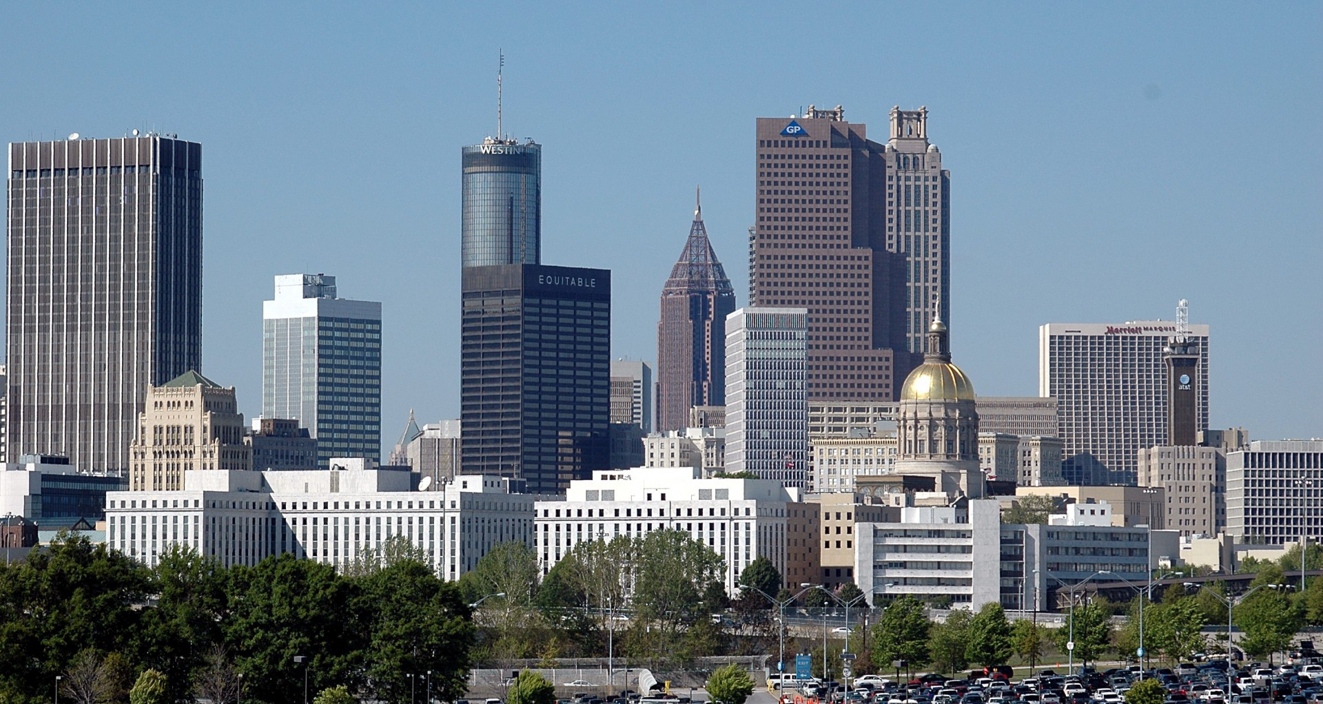 Atlanta ( at-LAN-tə, or  at-LAN-ə) is the capital and most populous city of the U.S. state of Georgia. It is the seat of Fulton County, and a portion of the city extends into neighboring DeKalb County. While not included in city limits, unincorporated areas addressed to Atlanta spill into portions of DeKalb, Cobb, Clayton, and Gwinnett counties. With a population of 498,715 living within the city limits, Atlanta is the eighth most populous city in the Southeast and 38th most populous city in the United States according to the 2020 U.S. census. It is the core of the much larger Atlanta metropolitan area, which is home to more than 6.2 million people (2022 estimate), making it the eighth-largest U.S. metropolitan area. Situated among the foothills of the Appalachian Mountains at an elevation of just over 1,000 feet (300 m) above sea level, Atlanta features unique topography that includes rolling hills, lush greenery, and the densest urban tree coverage of any major city in the United States.Atlanta was originally founded as the terminus of a major state-sponsored railroad, but it soon became the convergence point among several railroads, spurring its rapid growth. The largest was the Western and Atlantic Railroad, from which the name "Atlanta" is derived, signifying the city's growing reputation as a major hub of transportation. During the American Civil War, it served a strategically important role for the Confederacy until it was captured in 1864. The city was almost entirely burned to the ground during General William T. Sherman's March to the Sea. However, the city rebounded dramatically in the post-war period and quickly became a national industrial center and the unofficial capital of the "New South". After World War II, it also became a manufacturing and technology hub. During the 1950s and 1960s, it became a major organizing center of the American Civil Rights Movement, with Martin Luther King Jr., Ralph Abernathy, and many other locals becoming prominent figures in the movement's leadership. In the modern era, Atlanta has remained a major center of transportation, with Hartsfield-Jackson International Airport becoming the world's busiest airport by passenger traffic in 1998 (a position it has held every year since, except for 2020), with an estimated 93.7 million passengers in 2022.With a nominal gross domestic product (GDP) of $473 billion in 2021, Atlanta has the eleventh largest economy of cities in the U.S. and the 22nd largest in the world. Its economy is considered diverse, with dominant sectors in industries including transportation, aerospace, logistics, healthcare, news and media operations, film and television production, information technology, finance, and biomedical research and public policy. The gentrification of some of its neighborhoods, initially spurred by the 1996 Summer Olympics, has intensified in the 21st century with the growth of the Atlanta Beltline. This has altered its demographics, politics, aesthetics, and culture.