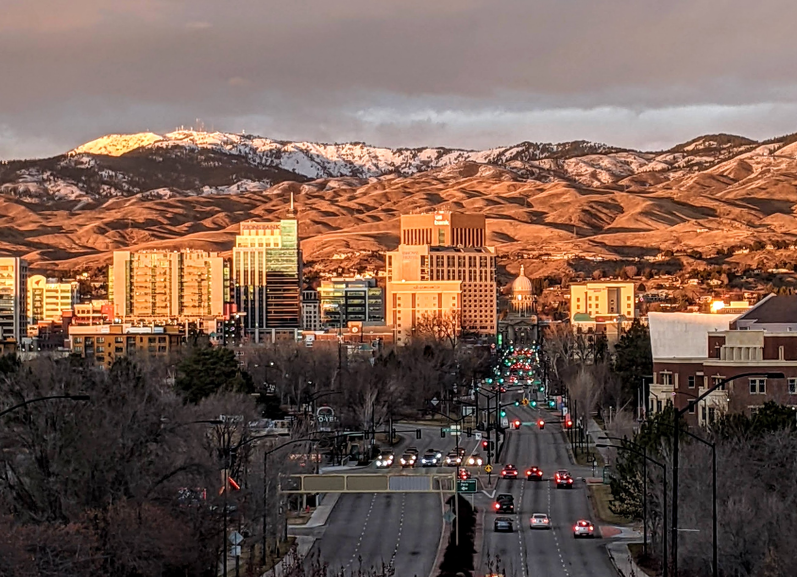 Boise (locally   BOY-see) is the capital and most populous city of the U.S. state of Idaho and is the county seat of Ada County. As of the 2020 census, there were 235,684 people residing in the city. On the Boise River in southwestern Idaho, it is 41 miles (66 km) east of the Oregon border and 110 miles (177 km) north of the Nevada border. The downtown area's elevation is 2,704 feet (824 m) above sea level.
The Boise metropolitan area, also known as the Treasure Valley, includes five counties with a combined population of 749,202, the most populous metropolitan area in Idaho. It contains the state's three largest cities: Boise, Nampa, and Meridian. The Boise–Nampa Metropolitan Statistical Area is the 77th most populous metropolitan statistical area in the United States.
Downtown Boise is the cultural center and home to many small businesses alongside a number of high-rise buildings. The area has a variety of shops and restaurants. Centrally, 8th Street contains a pedestrian zone with sidewalk cafes and restaurants. The neighborhood has many local restaurants, bars, and boutiques. The area also contains the Basque Block, which showcases Boise's Basque heritage. Downtown Boise's main attractions include the Idaho State Capitol, the classic Egyptian Theatre on the corner of Capitol Boulevard and Main Street, the Boise Art Museum on Capitol in front of Julia Davis Park, and Zoo Boise on the grounds of Julia Davis Park.