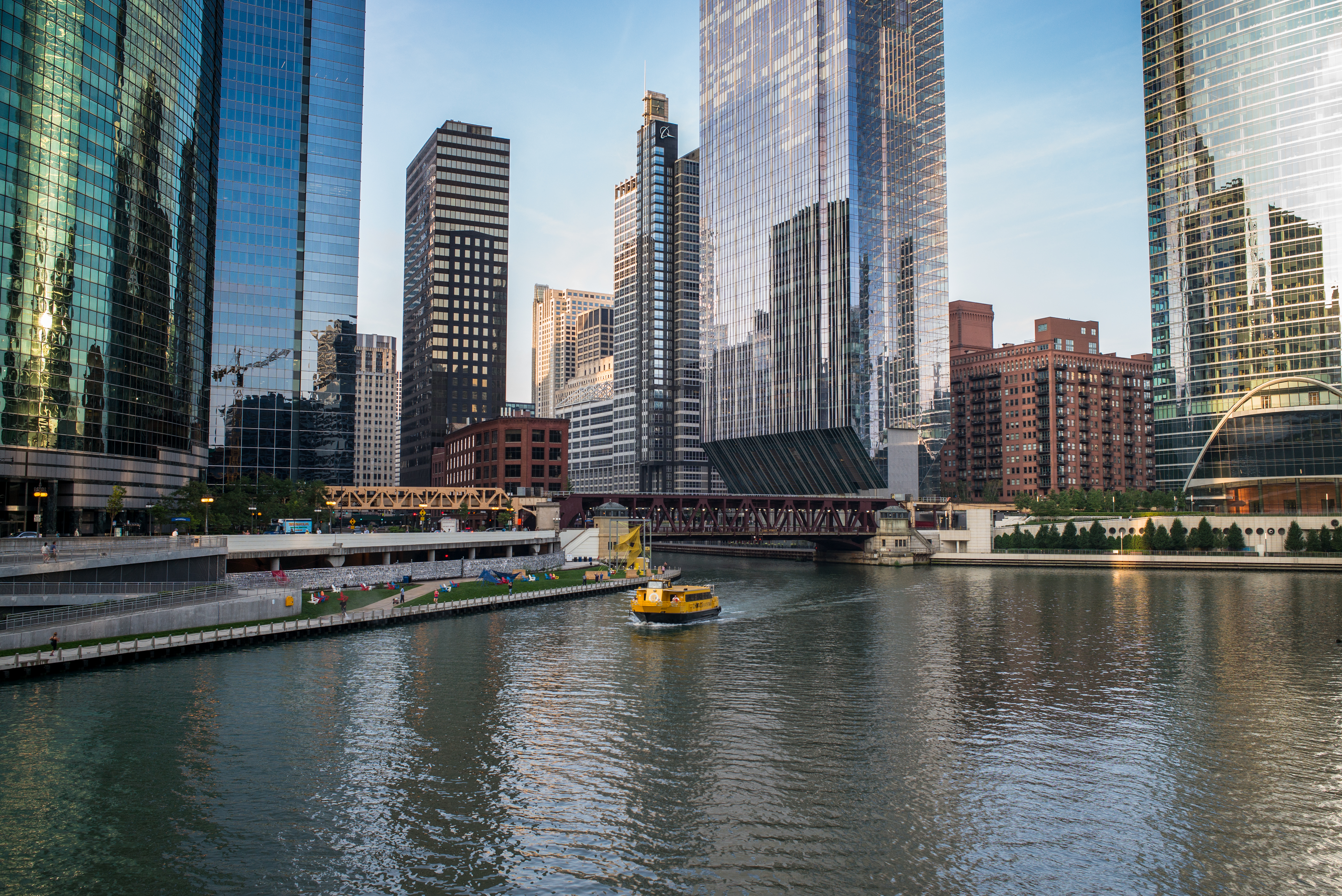 Chicago (  shih-KAH-goh, locally also  shih-KAW-goh; Miami-Illinois: Shikaakwa; Ojibwe: Zhigaagong) is the most populous city in the U.S. state of Illinois and the third-most populous in the United States after New York City and Los Angeles. With a population of 2,746,388 in the 2020 census, it is also the most populous city in the Midwest. As the seat of Cook County, the second-most populous county in the U.S., Chicago is the center of the Chicago metropolitan area.
Located on the shore of Lake Michigan, Chicago was incorporated as a city in 1837 near a portage between the Great Lakes and the Mississippi River watershed. It grew rapidly in the mid-19th century. In 1871, the Great Chicago Fire destroyed several square miles and left more than 100,000 homeless, but Chicago's population continued to grow. Chicago made noted contributions to urban planning and architecture, such as the Chicago School, the development of the City Beautiful Movement, and the steel-framed skyscraper.Chicago is an international hub for finance, culture, commerce, industry, education, technology, telecommunications, and transportation. It has the largest and most diverse derivatives market in the world, generating 20% of all volume in commodities and financial futures alone. O'Hare International Airport is routinely ranked among the world's top six busiest airports by passenger traffic, and the region is also the nation's railroad hub. The Chicago area has one of the highest gross domestic products (GDP) in the world, generating $689 billion in 2018. Chicago's economy is diverse, with no single industry employing more than 14% of the workforce.Chicago is a major tourist destination. Chicago's culture has contributed much to the visual arts, literature, film, theater, comedy (especially improvisational comedy), food, dance, and music (particularly jazz, blues, soul, hip-hop, gospel, and electronic dance music, including house music). Chicago is home to the Chicago Symphony Orchestra and the Lyric Opera of Chicago, while the Art Institute of Chicago provides an influential visual arts museum and art school. The Chicago area also hosts the University of Chicago, Northwestern University, and the University of Illinois Chicago, among other institutions of learning. Chicago has professional sports teams in each of the major professional leagues, including two Major League Baseball teams.