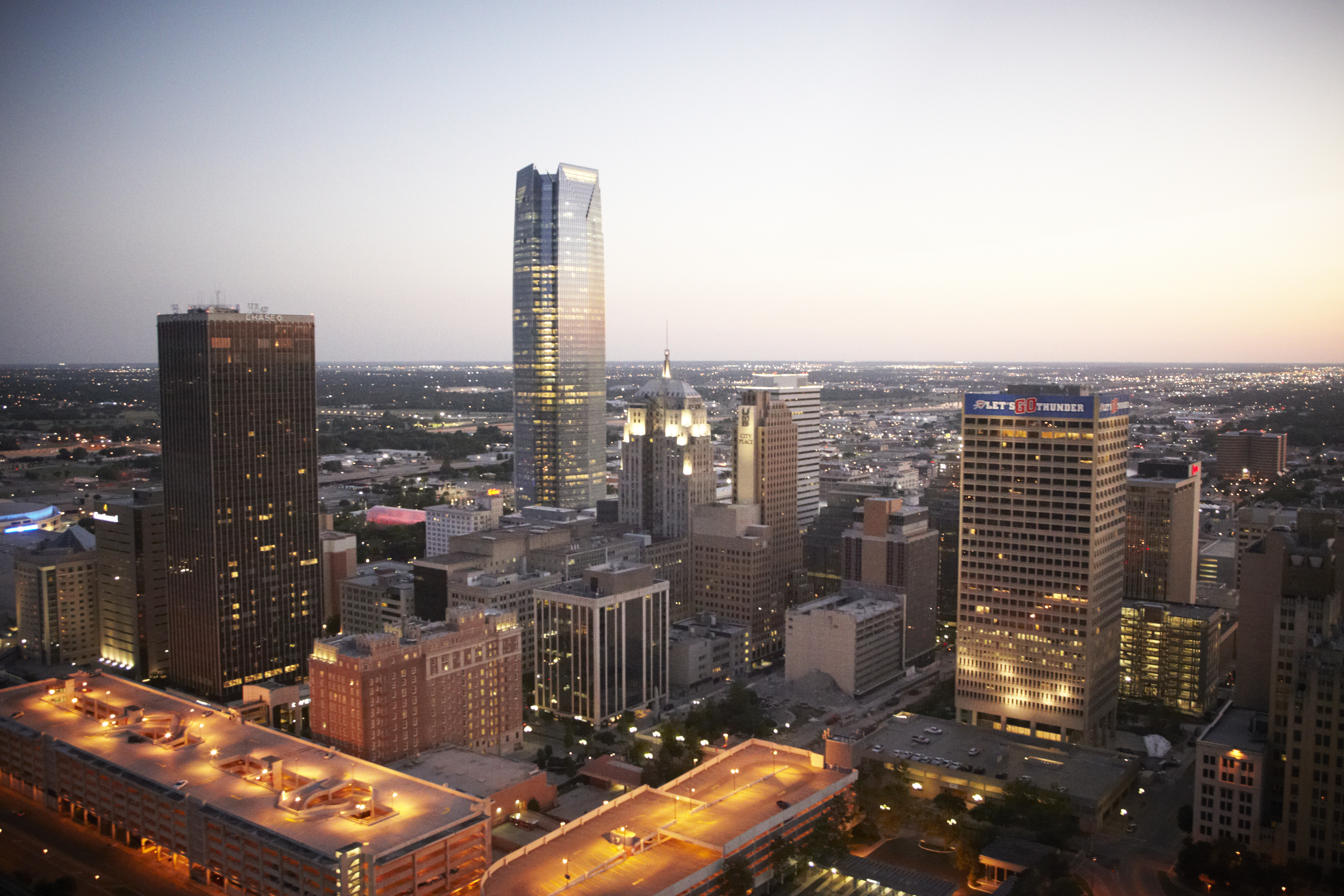 Oklahoma City ( ), officially the City of Oklahoma City, and often shortened to OKC, is the capital and most populous city of the U.S. state of Oklahoma. The county seat of Oklahoma County, it ranks 20th among United States cities in population, and is the 8th largest city in the Southern United States. The population grew following the 2010 census and reached 681,054 in the 2020 census. The Oklahoma City metropolitan area had a population of 1,396,445, and the Oklahoma City–Shawnee Combined Statistical Area had a population of 1,469,124, making it Oklahoma's largest municipality and metropolitan area by population.
Oklahoma City's city limits extend somewhat into Canadian, Cleveland, and Pottawatomie counties, though much of those areas outside the core Oklahoma County area are suburban tracts or protected rural zones (watershed). The city is the eighth-largest in the United States by area including consolidated city-counties; it is the second-largest, after Houston, not including consolidated cities. The city is also the second-largest by area among state capital cities in the United States, after Juneau, Alaska. Along with Topeka, Kansas and Cheyenne, Wyoming, Oklahoma City is one of three state capitals with an indigenous name in a state with an indigenous name.
Oklahoma City has one of the world's largest livestock markets. Oil, natural gas, petroleum products, and related industries are its economy's largest sector. The city is in the middle of an active oil field, and oil derricks dot the capitol grounds. The federal government employs a large number of workers at Tinker Air Force Base and the United States Department of Transportation's Mike Monroney Aeronautical Center (which house offices of the Federal Aviation Administration and the Transportation Department's Enterprise Service Center, respectively).
Oklahoma City is on the I-35 and I-40 corridors, one of the primary travel corridors south into neighboring Texas and New Mexico, north towards Wichita and Kansas City, west to Albuquerque, and east towards Little Rock and Memphis. Located in the state's Frontier Country region, the city's northeast section lies in an ecological region known as the Cross Timbers. The city was founded during the Land Run of 1889 and grew to a population of over 10,000 within hours of its founding. It was the site of the April 19, 1995, bombing of the Alfred P. Murrah Federal Building, in which 168 people died, the deadliest terror attack in U.S. history until the attacks of September 11, 2001, and the deadliest act of domestic terrorism in U.S. history.
Since weather records have been kept beginning in 1890, Oklahoma City has been struck by 14 violent tornadoes, 11 of which were rated F4 or EF4 on the Fujita and Enhanced Fujita scales, and one each rated F5 and EF5.