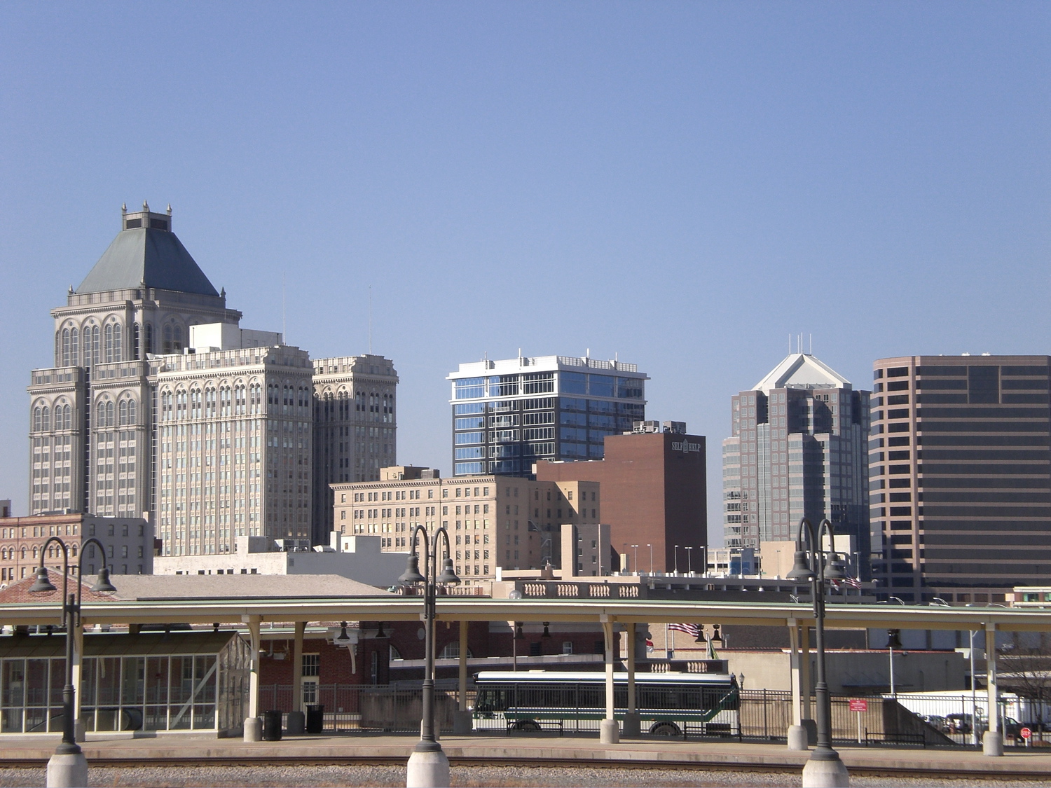 Greensboro ( ; local pronunciation ) is a city in and the county seat of Guilford County, North Carolina, United States. It is the 3rd most populous city in North Carolina after Charlotte and Raleigh, the 69th-most populous city in the United States, and the most populous city in the Piedmont Triad metropolitan region. At the 2020 census, its population was 299,035; at the 2022 census estimate, its population was 301,115. Three major Interstate Highways (Interstate 40, Interstate 85, and Interstate 73) in the Piedmont region of central North Carolina were built to intersect at this city.
In 1808, Greensborough (the spelling before 1895) was planned around a central courthouse square to succeed Guilford Court House as the county seat. The county courts were thus placed closer to the county's geographical center, a location more easily reached at the time by the majority of the county's citizens, who traveled by horse or on foot.In 2003, the previous Greensboro–Winston-Salem–High Point Metropolitan Statistical Area was redefined by the U.S. Office of Management and Budget. The region was separated into the Greensboro-High Point Metropolitan Statistical Area and the Winston-Salem Metropolitan Statistical Area. The population of the Greensboro-High Point Metropolitan Statistical Area was 776,566 in 2020. The Greensboro–Winston-Salem–High Point Combined Statistical Area, commonly called the Piedmont Triad, had a population of 1,695,306 in 2020.Among Greensboro's many notable attractions, some of the most popular are the Greensboro Science Center, the International Civil Rights Museum, The Steven Tanger Center for the Performing Arts, the Weatherspoon Art Museum, the Greensboro Symphony, and the Greensboro Ballet. Annual events in the city include the North Carolina Folk Festival, First Fridays in Downtown Greensboro, Fun Fourth of July Festival, North Carolina Comedy Festival, and Winter Wonderlights. From 2015 to 2017, Greensboro hosted the National Folk Festival.The Greensboro Coliseum Complex hosts a variety of major sporting events, concerts, and other events. The main coliseum has been the site of the ACC men's basketball tournament 28 times (including the most recent tournament in 2023), more than twice the number hosted by any other site; it has hosted the ACC women's basketball tournament every year since 2000 (except for 2017). Since 2009, it has served as the home court for the UNCG Spartans NCAA Division I basketball team. The Novant Health Fieldhouse is home to the Greensboro Swarm of the NBA G League. In 2011, a major expansion of the complex added several new facilities, including the White Oak Amphitheatre, the Greensboro Aquatic Center, and the ACC Hall of Champions.
Local professional teams include the Greensboro Grasshoppers of the South Atlantic Baseball League, and the semi-professional Carolina Dynamo soccer club of USL League Two. Amateur teams include Greensboro Roller Derby and college teams in four NCAA programs. The Sedgefield Country Club features a Donald Ross course and is currently host to the annual PGA Tour event Wyndham Golf Championship. In 1953, representatives from seven member institutions of the Southern Conference met at the club and decided to withdraw from the Southern Conference to form a new league, the Atlantic Coast Conference. Greensboro would serve as Atlantic Coast Conference headquarters for 70 years, until the league relocated to Charlotte, North Carolina.