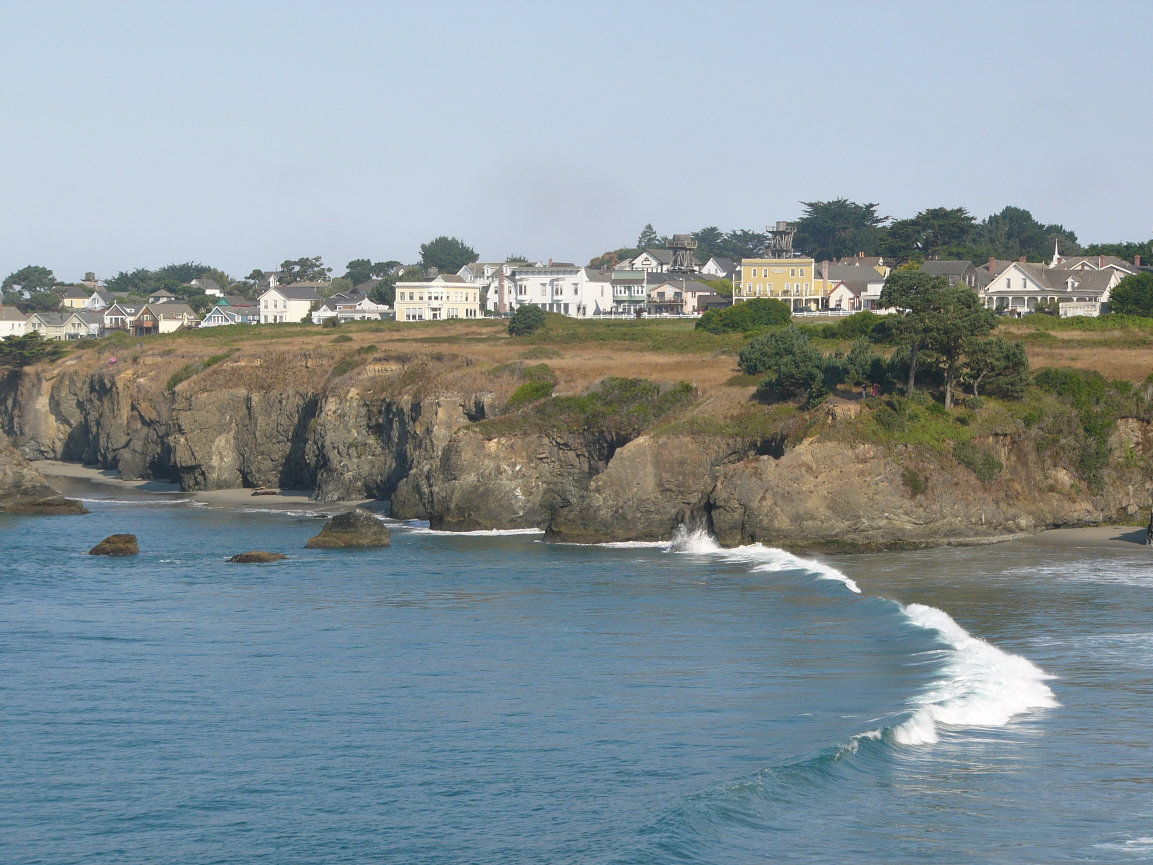 Mendocino County ( ; Mendocino, Spanish for "of Mendoza") is a county located on the North Coast of the U.S. state of California. As of the 2020 census, the population was 91,601. The county seat is Ukiah.Mendocino County consists wholly of the Ukiah, CA Micropolitan Statistical Area (μSA) for the purposes of the U.S. Census Bureau. It is located approximately equidistant from the San Francisco Bay Area and California/Oregon border, separated from the Sacramento Valley to the east by the California Coast Ranges. While smaller areas of redwood forest are found further south, it is the southernmost California county to be included in the World Wildlife Fund's Pacific temperate rainforests ecoregion, the largest temperate rainforest ecoregion on the planet.The county is noted for its distinctive Pacific Ocean coastline, its location along California's "Lost Coast",  Redwood forests, wine production, microbrews, and liberal views about the use of cannabis and support for its legalization. In 2009, it was estimated that roughly one-third of the economy was based on the cultivation of marijuana.The notable historic and recreational attraction of the "Skunk Train" connects Fort Bragg with Willits in Mendocino County via a steam-locomotive engine, along with other vehicles.
Mendocino is one of three Northern California counties to make up the "Emerald Triangle", along with Humboldt and Trinity counties.