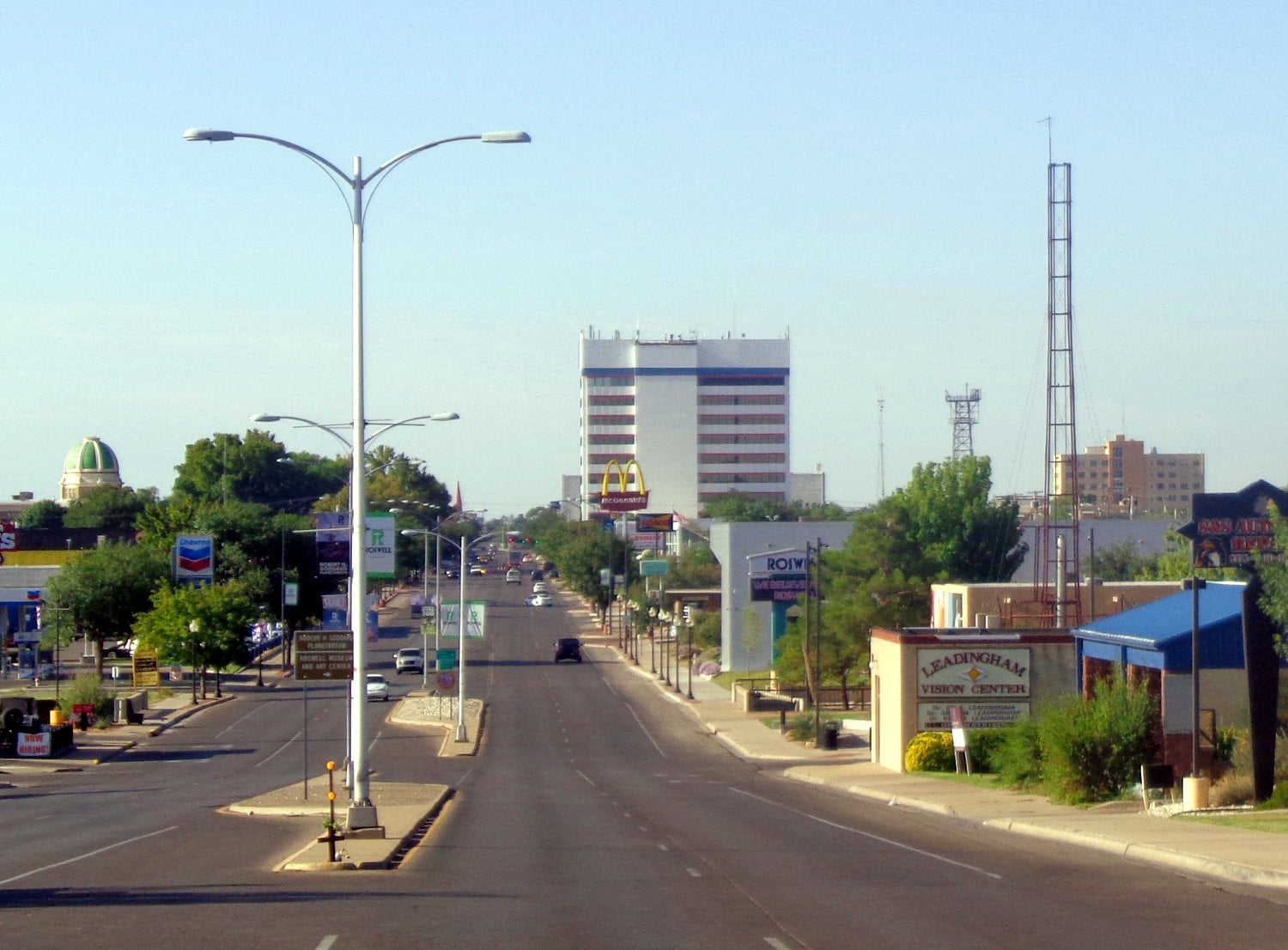 Roswell () is a city in and the seat of Chaves County, New Mexico, United States. As of the 2020 census it had a population of 48,422, making it the fifth-most populous city in New Mexico. It is home of the New Mexico Military Institute (NMMI), founded in 1891. The city is also the location of an Eastern New Mexico University campus. Bitter Lake National Wildlife Refuge is located a few miles northeast of the city on the Pecos River. Bottomless Lakes State Park is located 12 miles (19 km) east of Roswell on US 380. Chaves County forms the entirety of the Roswell micropolitan area.
The Roswell incident was named after the town, though the crash site of the alleged UFO was some 75 miles (121 km) from Roswell and closer to Corona. The investigation and debris recovery was handled by the local Roswell Army Air Field. On the 50th anniversary of the Roswell incident, an annual UFO Festival was started. In the 1930s, Roswell was a site for much of Robert H. Goddard's early rocketry work. The Roswell Museum and Art Center maintains an exhibit that includes a recreation of Goddard's rocket engine development workshop, and Goddard High School is named after him.
Roswell's tourism industry is based on aerospace engineering and ufology museums and businesses, as well as alien-themed and spacecraft-themed iconography. The city also relies on New Mexico and Americana related tourism. New Mexican cuisine restaurants, such as Martin's Capitol Café, are located near downtown on Main Street, near the International UFO Museum and Research Center. Local American folk and New Mexico music performances occur near Pioneer Plaza and in parks around the city. It is a center for acequia-like irrigated farming, dairying, and ranching; it is also the location of several manufacturing, distribution, and petroleum related facilities. Roswell has a history of minor league baseball. This regional pride has resulted in Roswell receiving the All-America City Award multiple times, in 1978–79 and 2002.