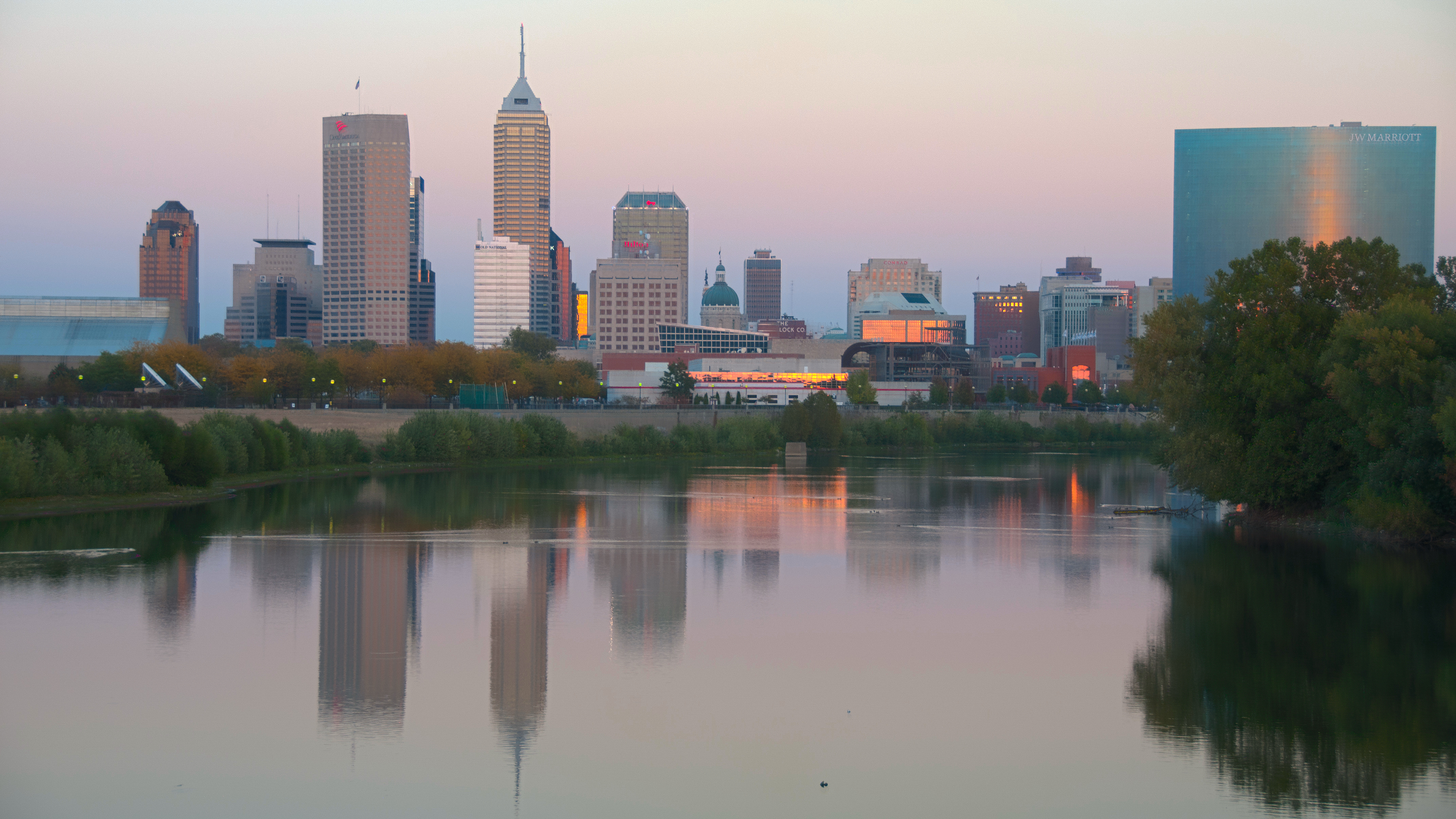 The Indianapolis metropolitan area is an 11-county metropolitan area in the U.S. state of Indiana. Its principal cities are Indianapolis, Carmel, Greenwood, and Anderson. Other primary cities with populations of more than 50,000 include Fishers, Noblesville, and Westfield. Located in Central Indiana, it is the largest metropolitan area entirely within Indiana and the seventh largest in the American Midwest.
There are two official metropolitan boundaries for the Indianapolis metro area: the Indianapolis–Carmel–Greenwood, IN Metropolitan Statistical Area (MSA) and the Indianapolis–Carmel–Muncie, IN Combined Statistical Area (CSA). The two regions are identical except for the addition of three metropolitan areas (Columbus, Kokomo, and Muncie) and six micropolitan statistical areas (Crawfordsville, Greencastle, Greensburg, Seymour, New Castle, and Peru) to the Indianapolis–Carmel–Muncie CSA that are not included in the Indianapolis–Carmel–Greenwood MSA. The population of the MSA was 2,111,040 and the population of the CSA was 2,457,286 as of the 2020 Census.
The Indianapolis metropolitan area is a major center for agribusiness, distribution and logistics, life sciences, manufacturing, and motorsports. In 2021, the gross domestic product of the Indianapolis metropolitan area was (USD) $162.1 billion, among the 30 largest metropolitan economies in the U.S. In 2023, the Indianapolis metropolitan area was home to three Fortune 500 companies and six Fortune 1000 companies. The metropolitan area is home to several higher education institutions, including Anderson University, Butler University, Franklin College, Indiana University–Purdue University Indianapolis, Marian University, and the University of Indianapolis, among others. Ivy Tech Community College has several campuses throughout the region.