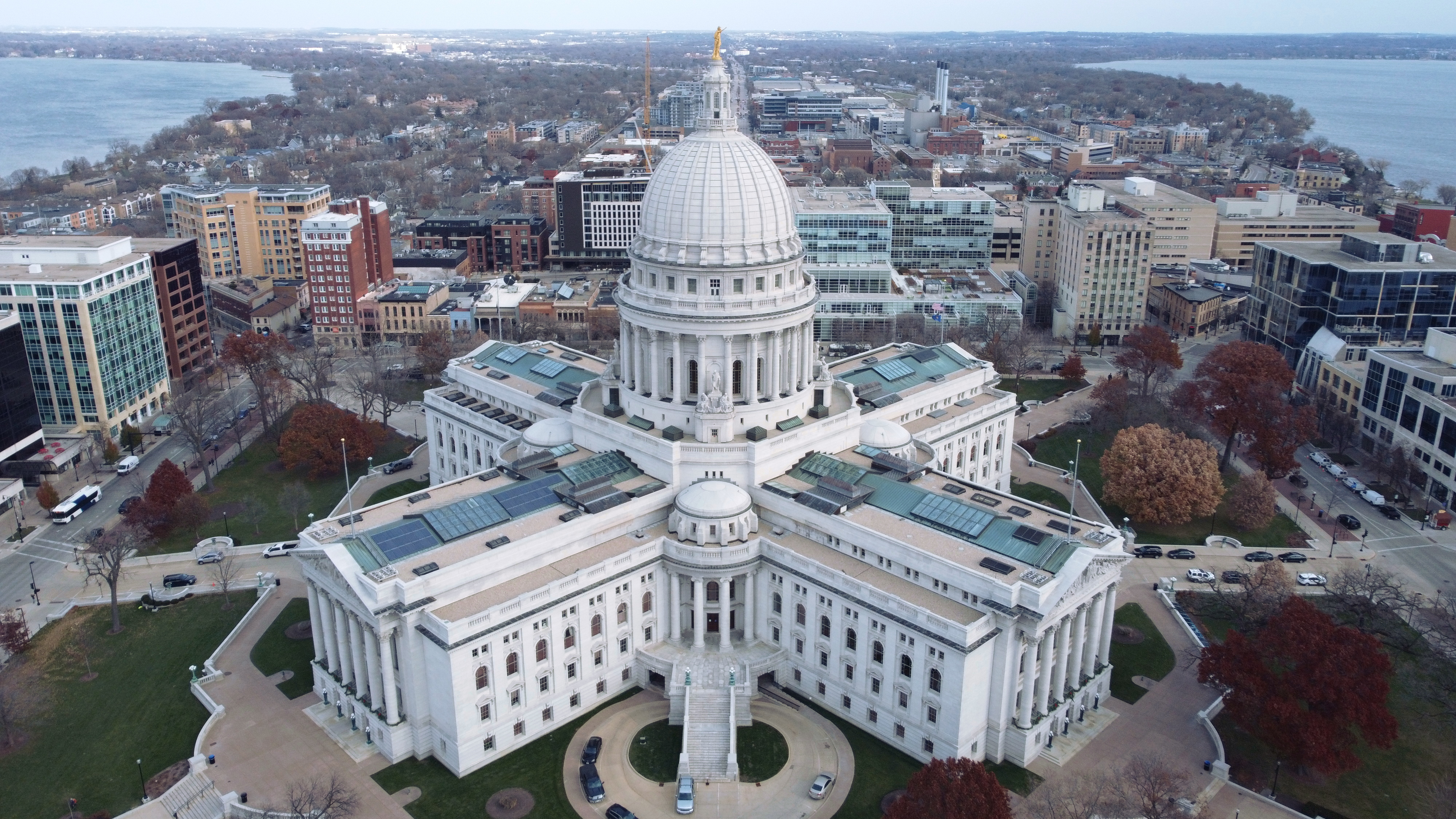 Madison is the capital city of the state of Wisconsin and the county seat of and largest city in Dane County. As of the 2020 census the population was 269,840, making it the second most populous city in Wisconsin after Milwaukee, and the 80th most populous in the United States. Madison is named for American Founding Father and President James Madison.
Located on an isthmus and lands surrounding five lakes—Lake Mendota, Lake Monona, Lake Wingra, Lake Kegonsa and Lake Waubesa—the city is home to the University of Wisconsin–Madison, the Wisconsin State Capitol, the Overture Center for the Arts, and the Henry Vilas Zoo. Madison is home to an extensive network of parks and bike trails; it has the most parks and playgrounds per capita of any of the 100 largest U.S. cities and is one of five communities to have received a "Platinum Bicycle Friendly Community" rating from the League of American Bicyclists. Madison is also home to nine National Historic Landmarks, including several buildings designed by architect Frank Lloyd Wright, such as his 1937 Jacobs I House, which is a UNESCO World Heritage Site.Residents of Madison are known as Madisonians. Madison has long been a center for progressive political activity, protests, and demonstrations, and contemporary Madison is considered the most politically liberal city in Wisconsin. The presence of the University of Wisconsin–Madison (the largest employer in the state) as well as other educational institutions has a significant impact on the economy, culture, and demographics of Madison.As of 2021, Madison is the fastest-growing city in Wisconsin. Madison's economy features a large and growing technology sector, and the Madison area is home to the headquarters of Epic Systems, American Family Insurance, Exact Sciences, Promega, American Girl, Sub-Zero, Lands' End, Spectrum Brands, a regional office for Google, and the University Research Park, as well as many biotechnology and health systems startups. Madison is a popular visitor destination, with tourism generating over $1 billion for Dane County's economy in 2018.